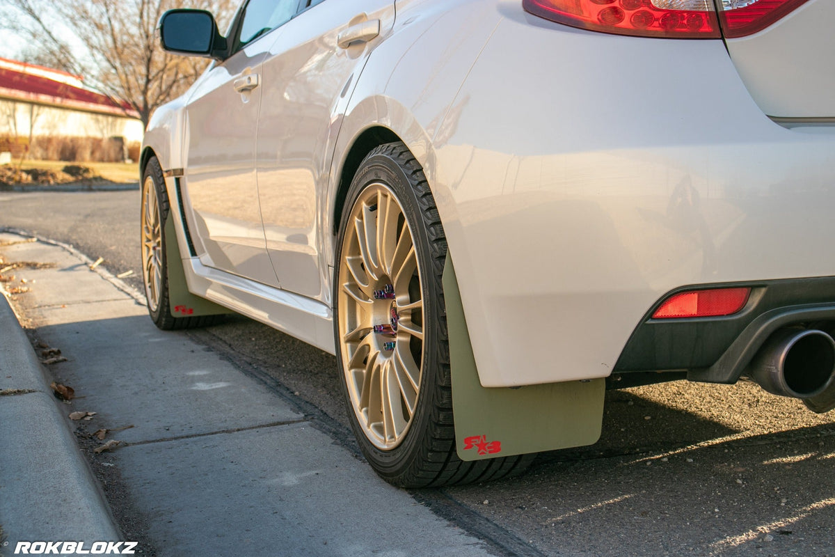 08-14 STI Hatch featuring Rokblokz Rally style Mud flaps in Olive Drab/red logo Original