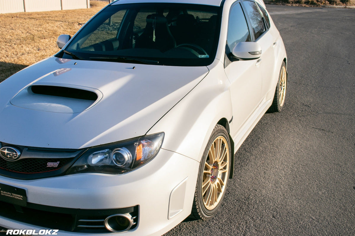 08-14 STI Hatch featuring Rokblokz Rally style Mud flaps in Olive Drab/red logo Original