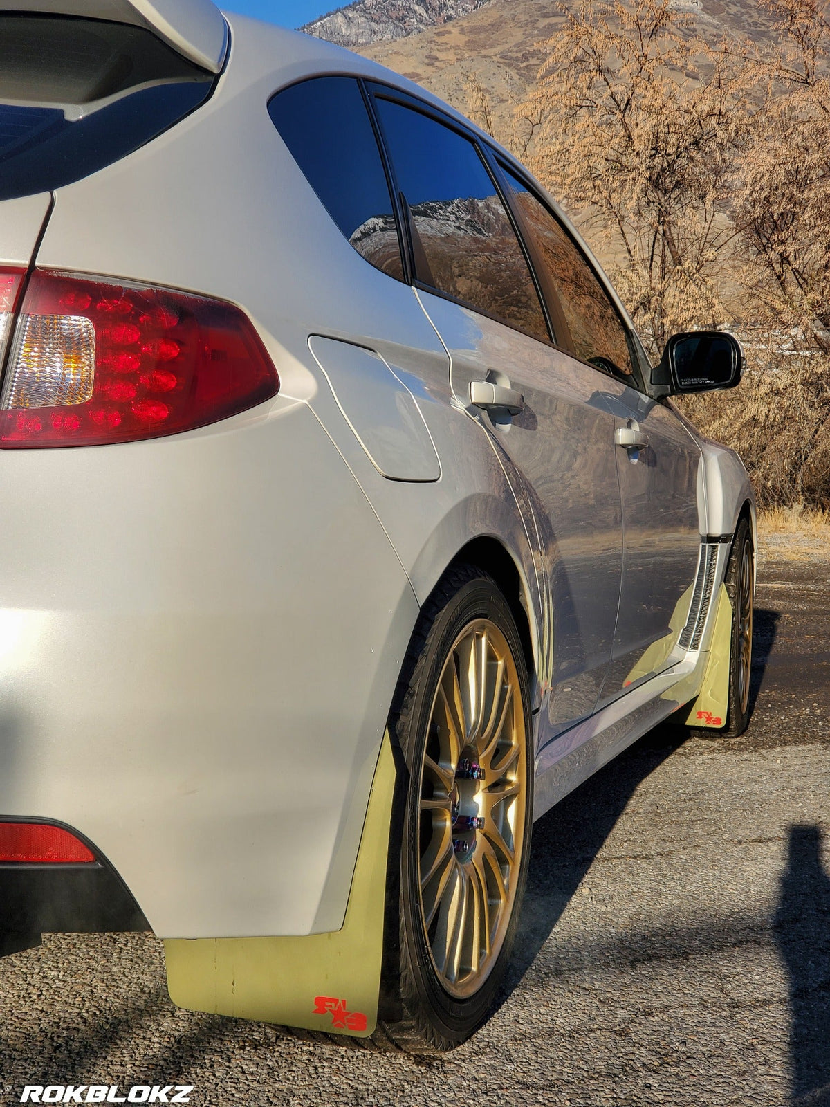 08-14 STI Hatch featuring Rokblokz Rally style Mud flaps in Olive Drab/red logo Original