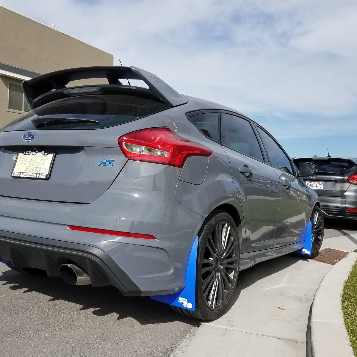 Focus RS Featuring Rokblokz Mud Flaps: Deep Blue Flaps in Original Length