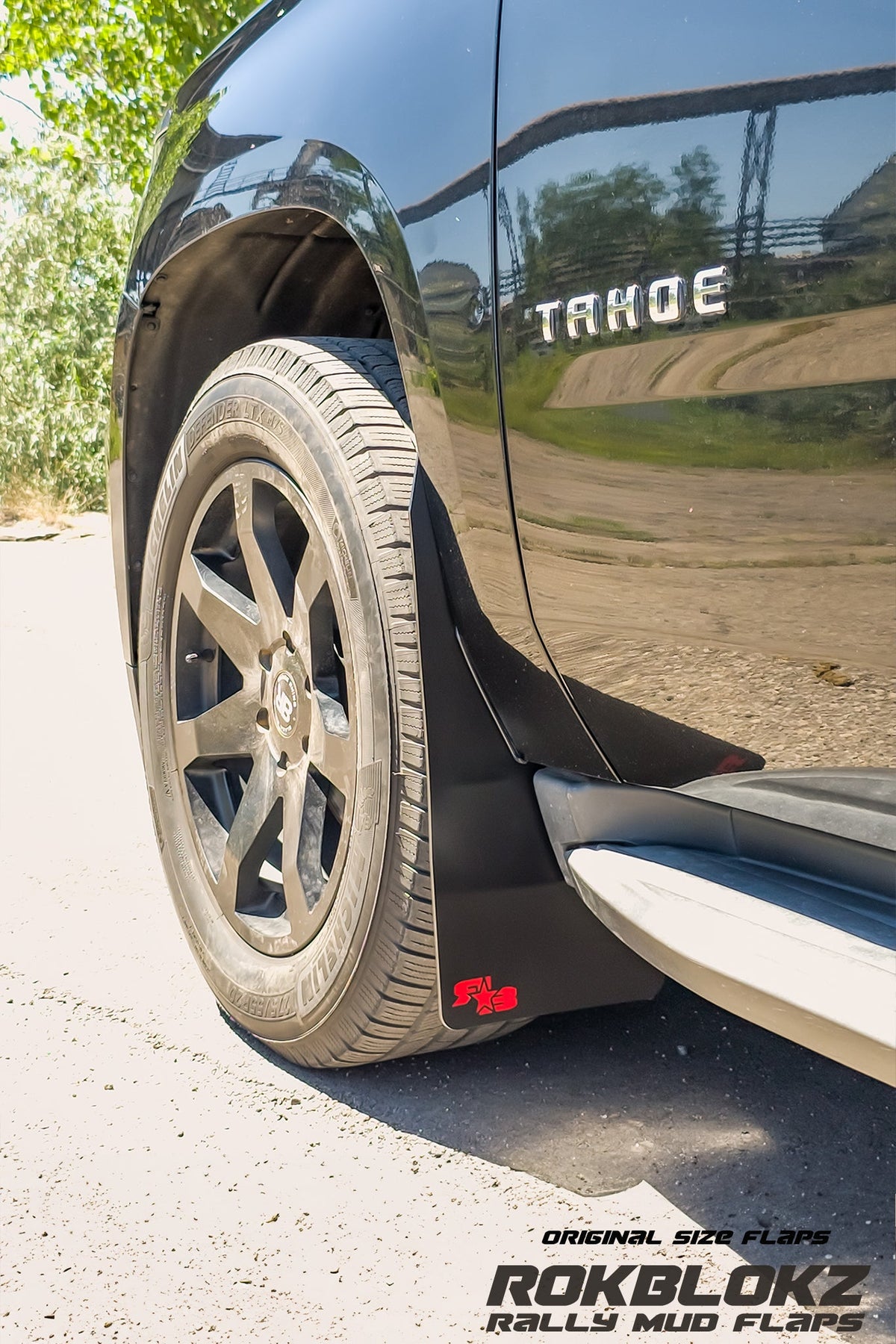 2015 Chevy Tahoe Ft. Rokblokz Mud Flaps in black - front