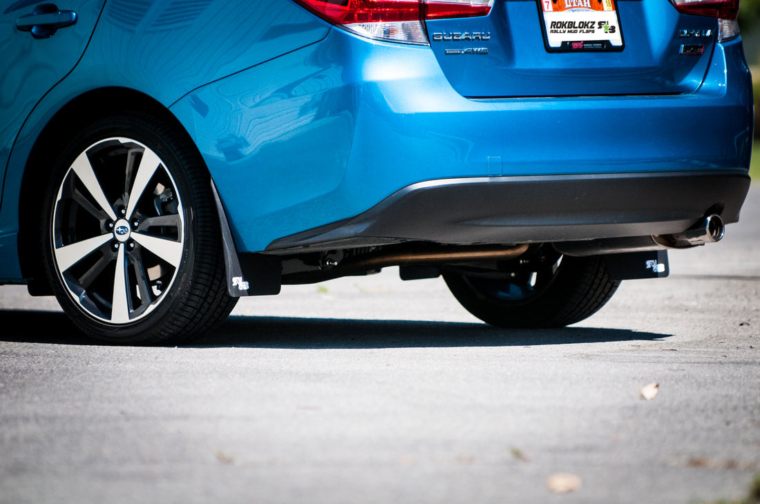 17 Impreza featuring Rokblokz Mud Flaps in Black w/ White logo Original 