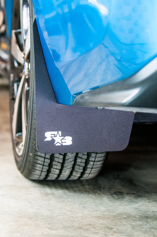 17 Impreza featuring Rokblokz Mud Flaps in Black w/ White logo Original 