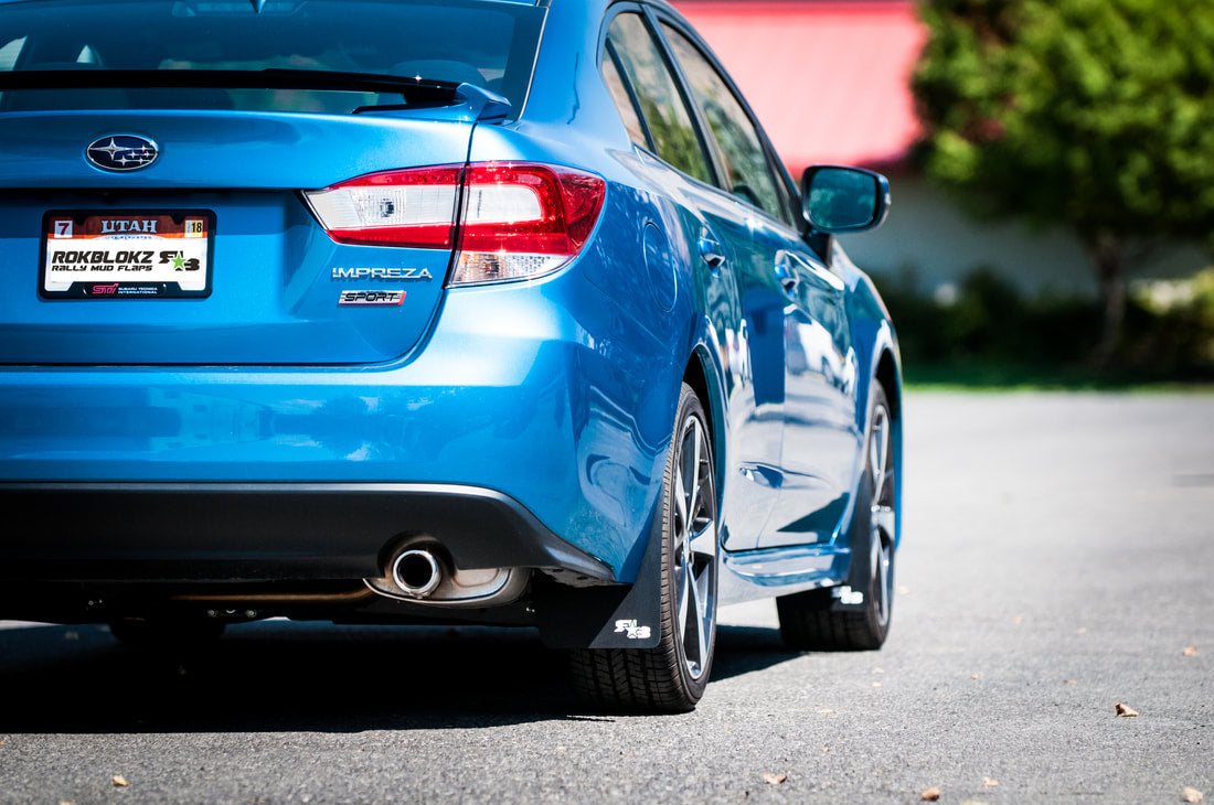 17 Impreza featuring Rokblokz Mud Flaps in Black w/ White logo Original 