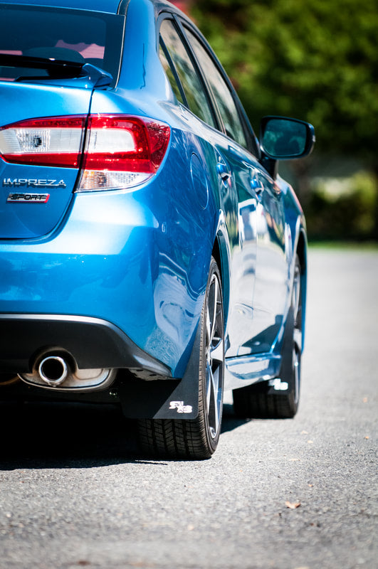 17 Impreza featuring Rokblokz Mud Flaps in Black w/ White logo Original 