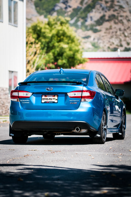 17 Impreza featuring Rokblokz Mud Flaps in Black w/ White logo Original 