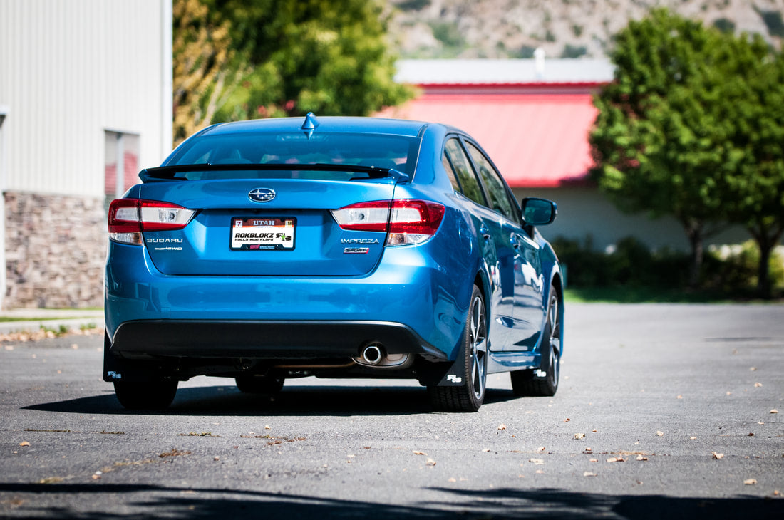 17 Impreza featuring Rokblokz Mud Flaps in Black w/ White logo Original 