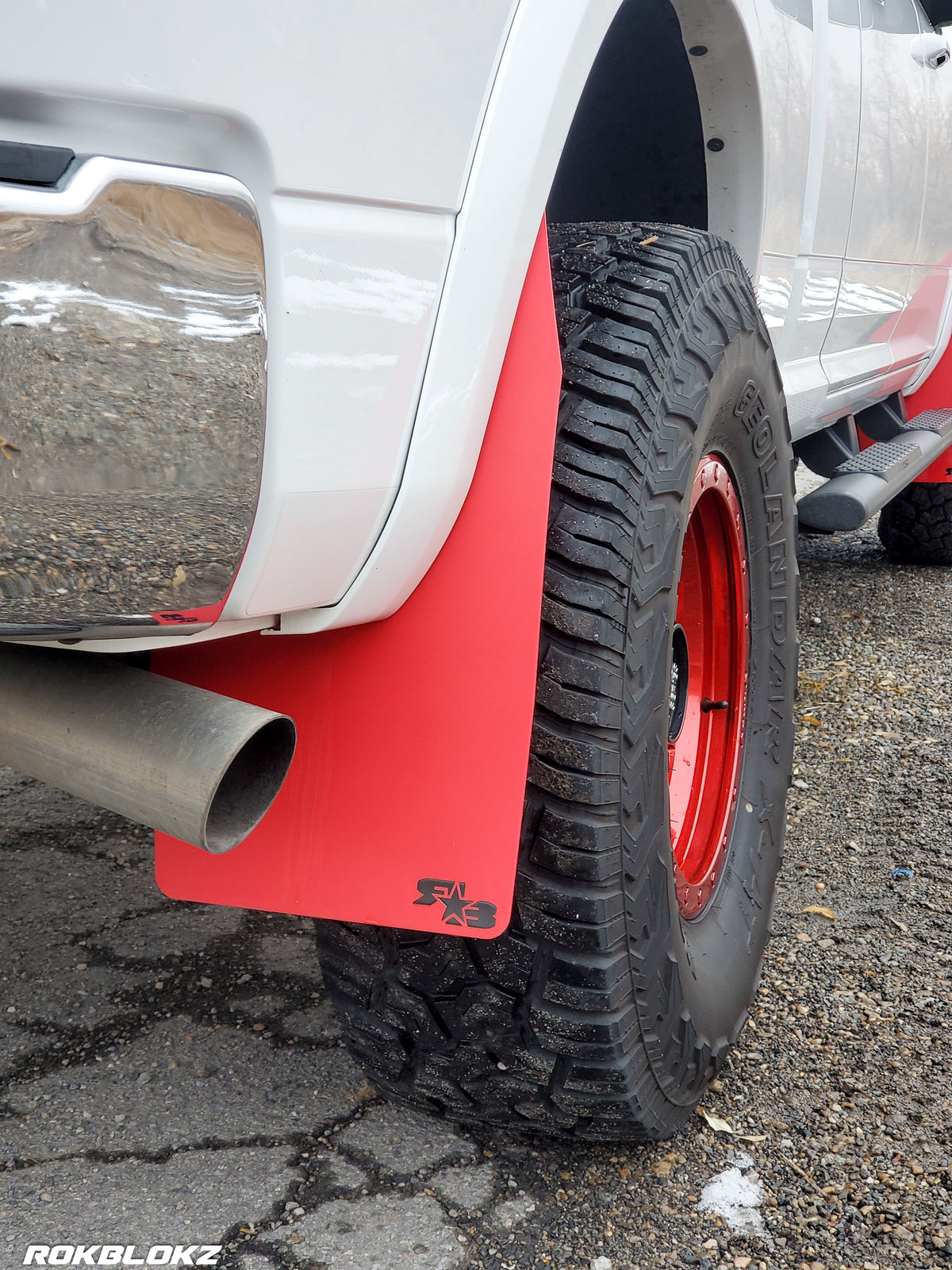 Ram 2500 Featuring XL Mud Flaps in Red