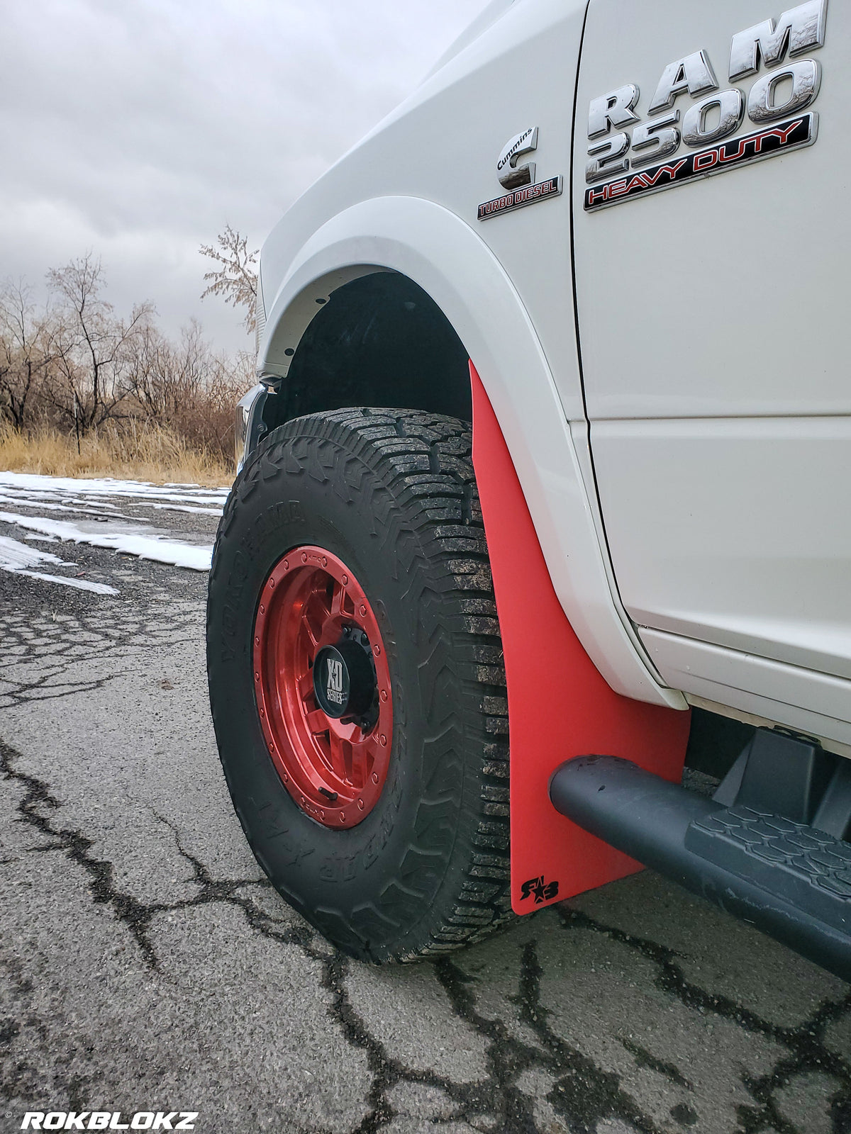 Ram 2500 Featuring XL Mud Flaps in Red