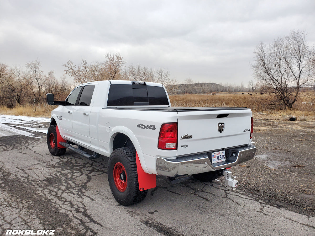 Ram 2500 Featuring XL Mud Flaps in Red