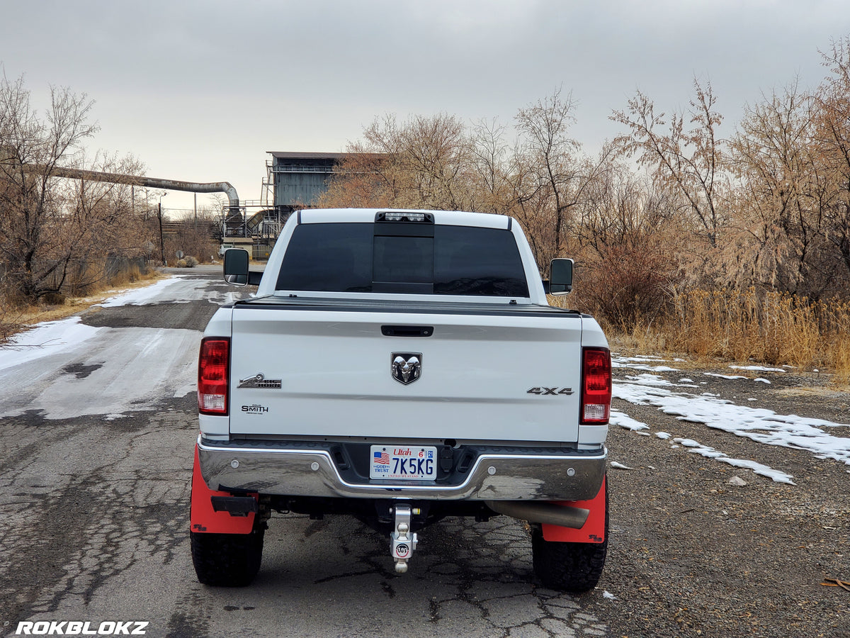 Ram 2500 Featuring XL Mud Flaps in Red