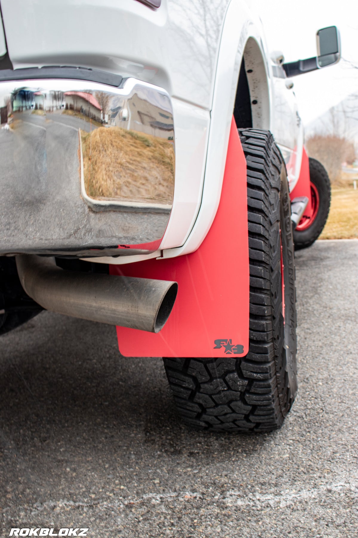 Ram 2500 Featuring XL Mud Flaps in Red