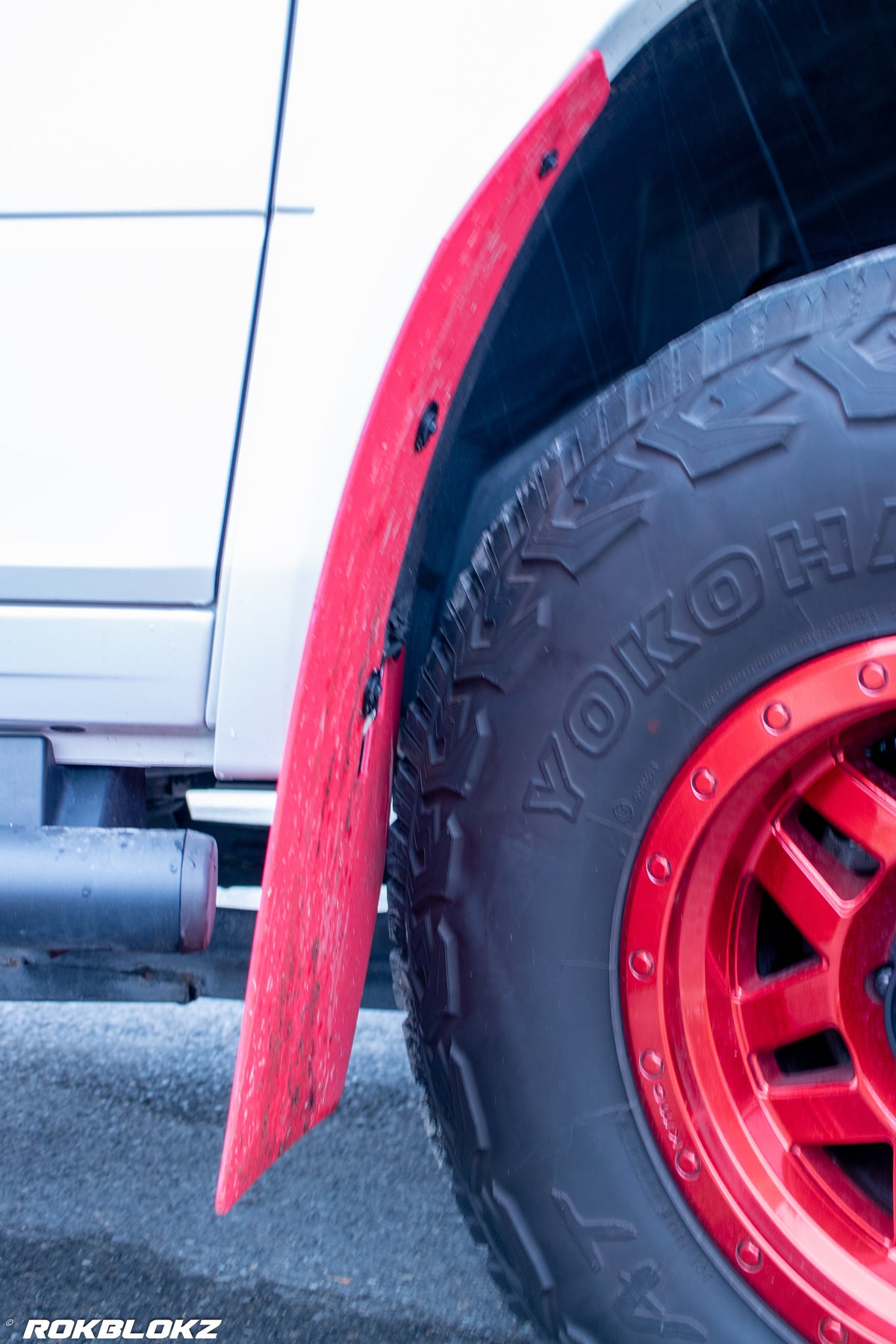 Ram 2500 Featuring XL Mud Flaps in Red