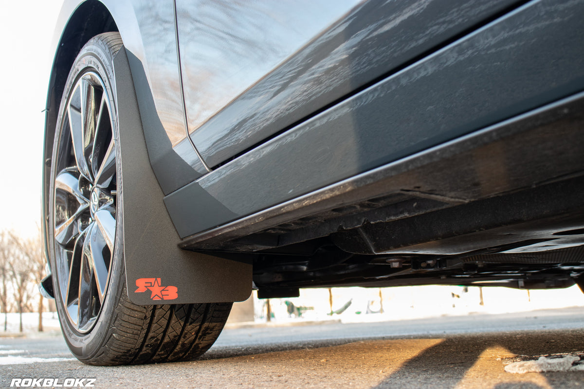 2021 AWD Mazda3 Turbo Featuring Rokblokz Mud Flaps in Black w/ red logo Original length