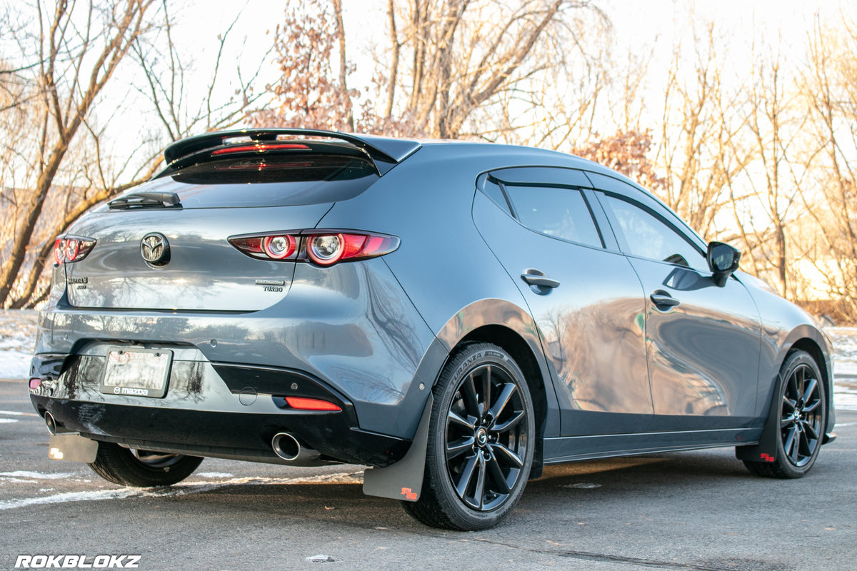 2021 AWD Mazda3 Turbo Featuring Rokblokz Mud Flaps in Black w/ red logo Original length