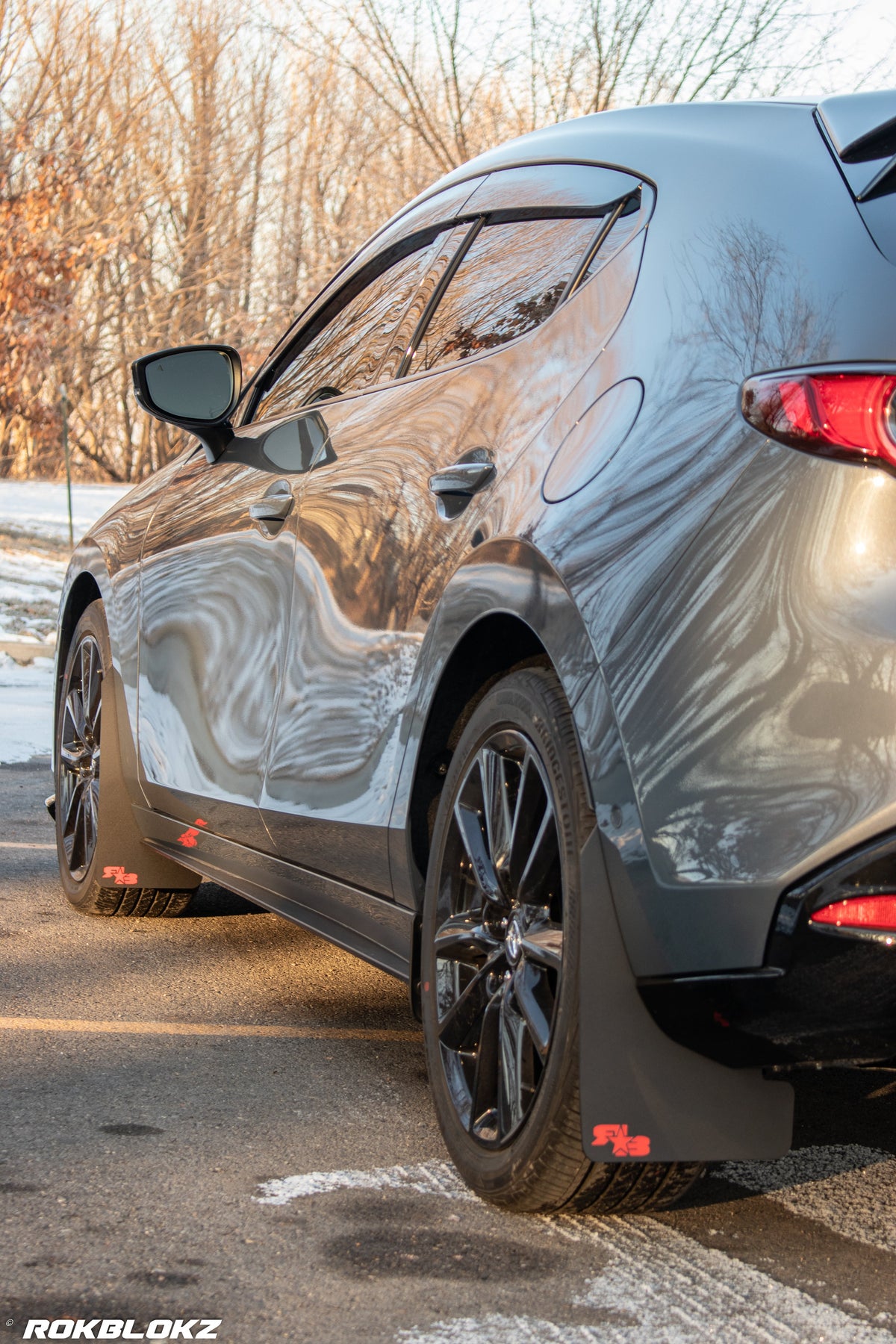 2021 AWD Mazda3 Turbo Featuring Rokblokz Mud Flaps in Black w/ red logo Original length