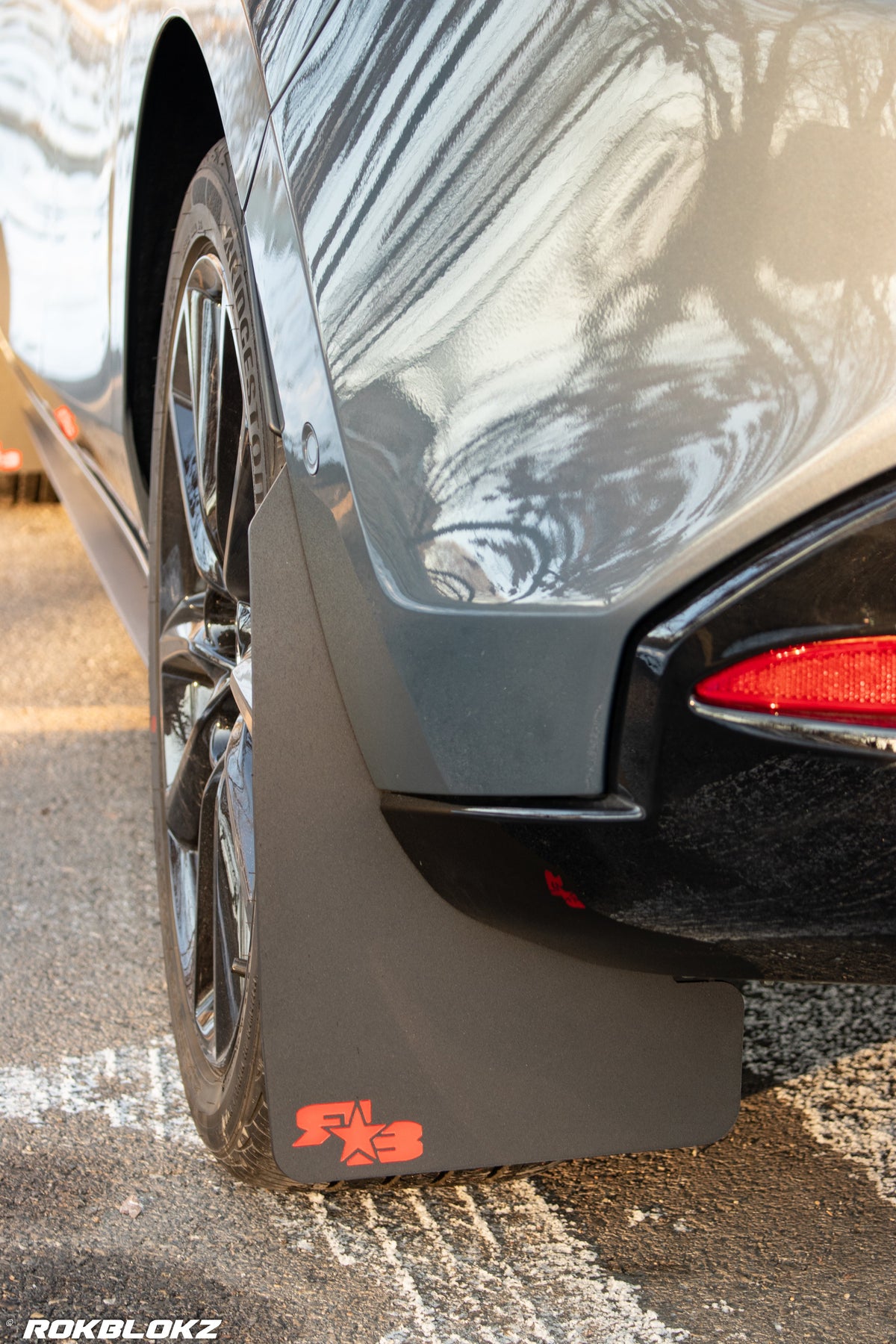 2021 AWD Mazda3 Turbo Featuring Rokblokz Mud Flaps in Black w/ red logo Original length