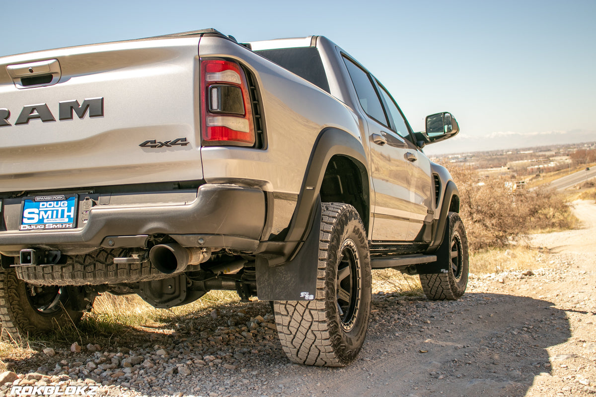 2021 Ram 1500 TRX featuring Rokblokz Mud Flaps Black w/ Grey Logo in Original size