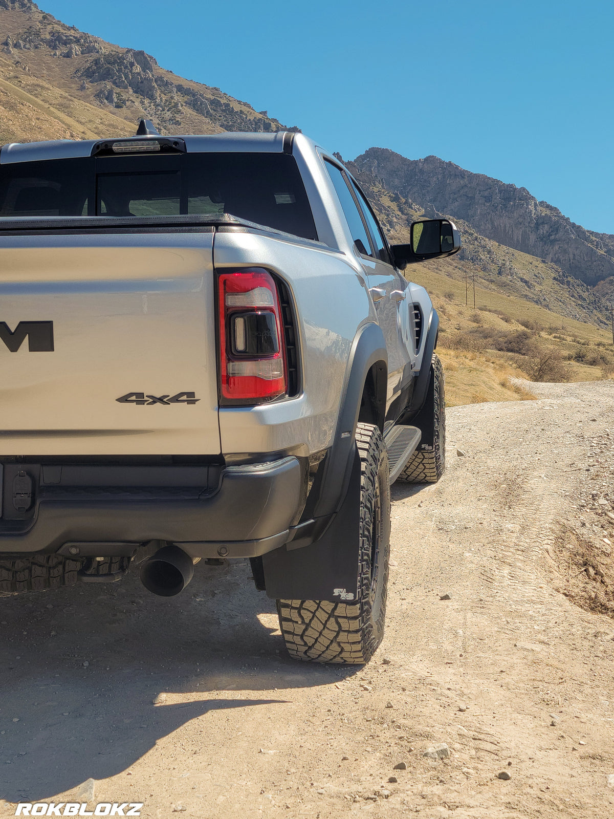 2021 Ram 1500 TRX featuring Rokblokz Mud Flaps Black w/ Grey Logo in Original size