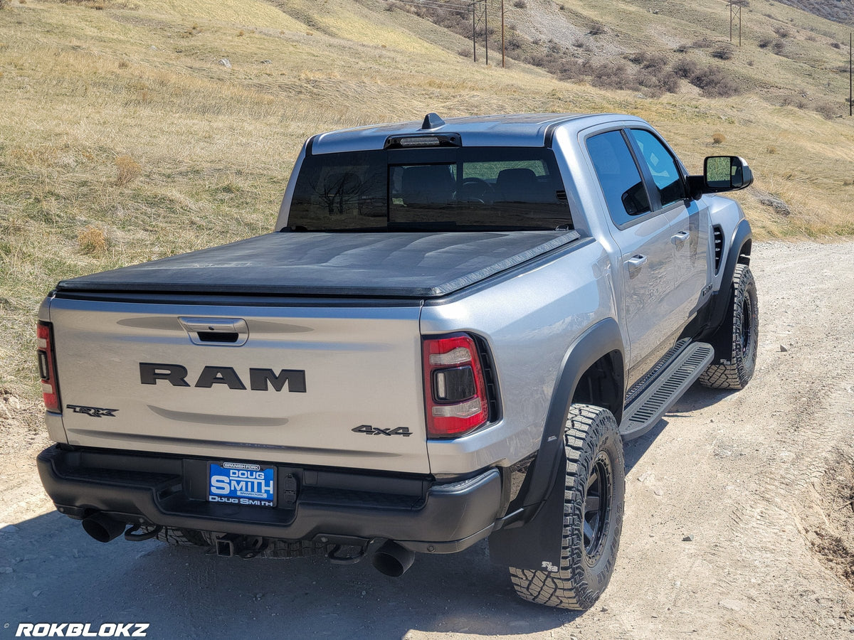 2021 Ram 1500 TRX featuring Rokblokz Mud Flaps Black w/ Grey Logo in Original size