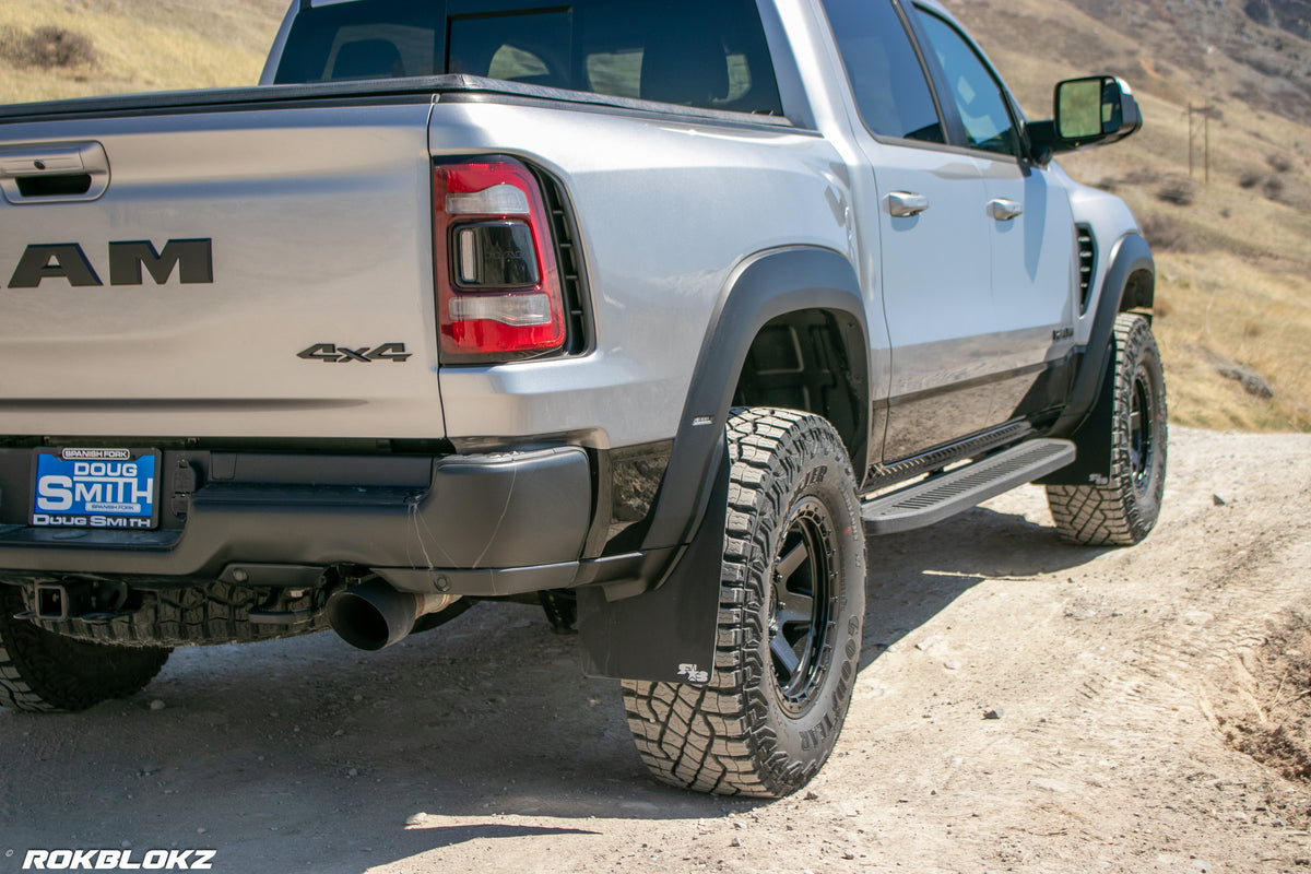 2021 Ram 1500 TRX featuring Rokblokz Mud Flaps Black w/ Grey Logo in Original size