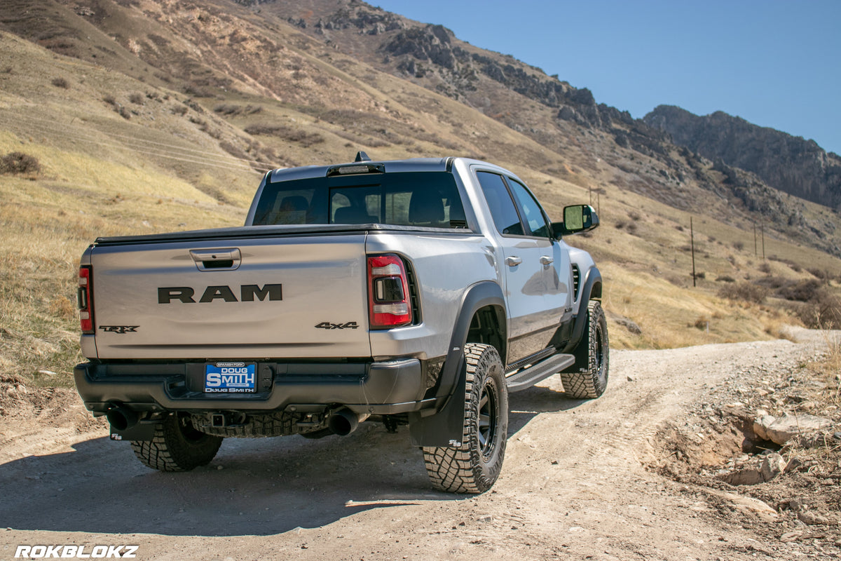 2021 Ram 1500 TRX featuring Rokblokz Mud Flaps Black w/ Grey Logo in Original size