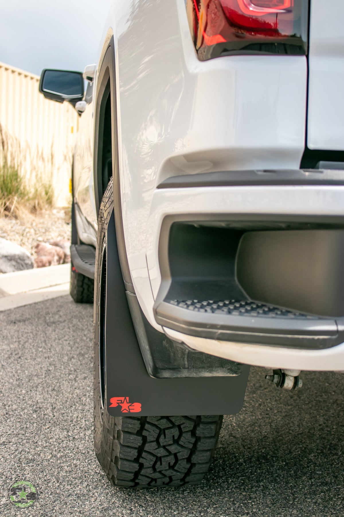 2022 GMC Sierra Ft. Rokblokz Mud Flaps in Original - rear up close