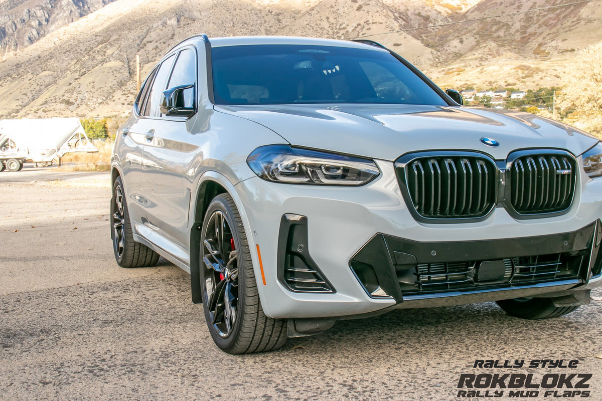 2023 BMW X3 M featuring Rokblokz Rally Mud flaps, from the front