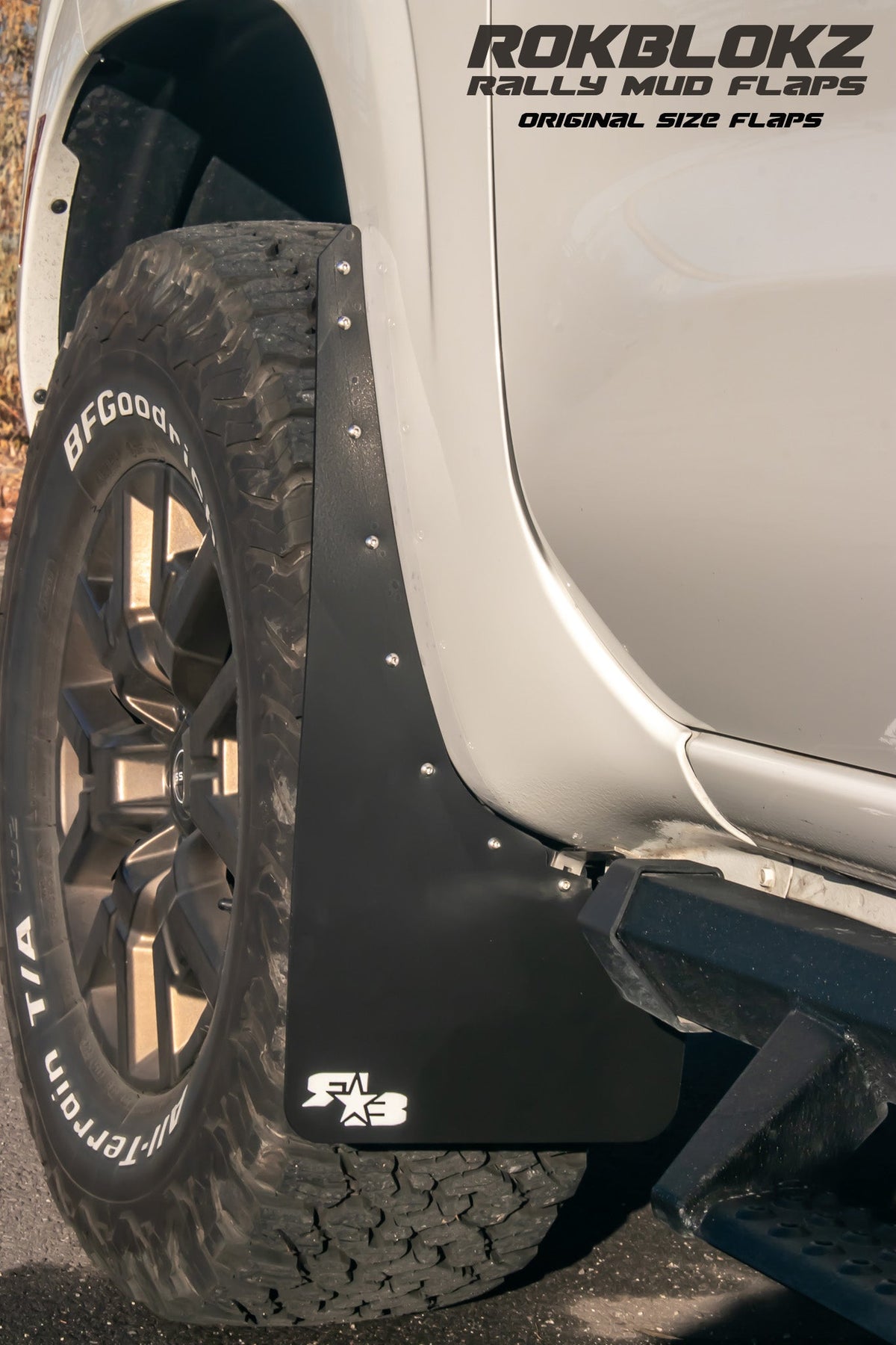 22+ Nissan Frontier SV Featuring Rokblokz Mud Flaps in Black - Front