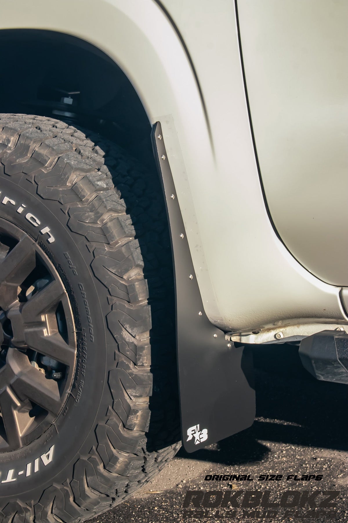 22+ Nissan Frontier SV Featuring Rokblokz Mud Flaps in Black - front side view