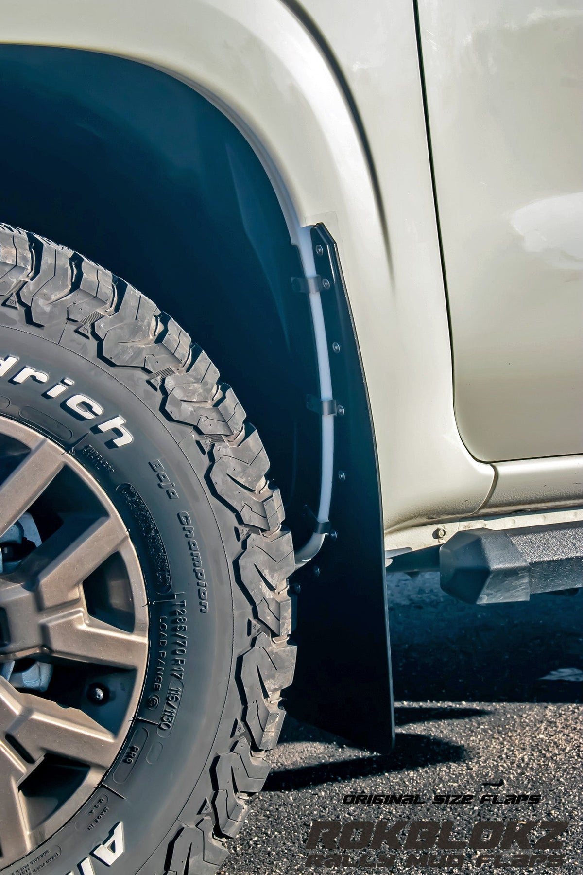 22+ Nissan Frontier SV Featuring Rokblokz Mud Flaps in Black - front view