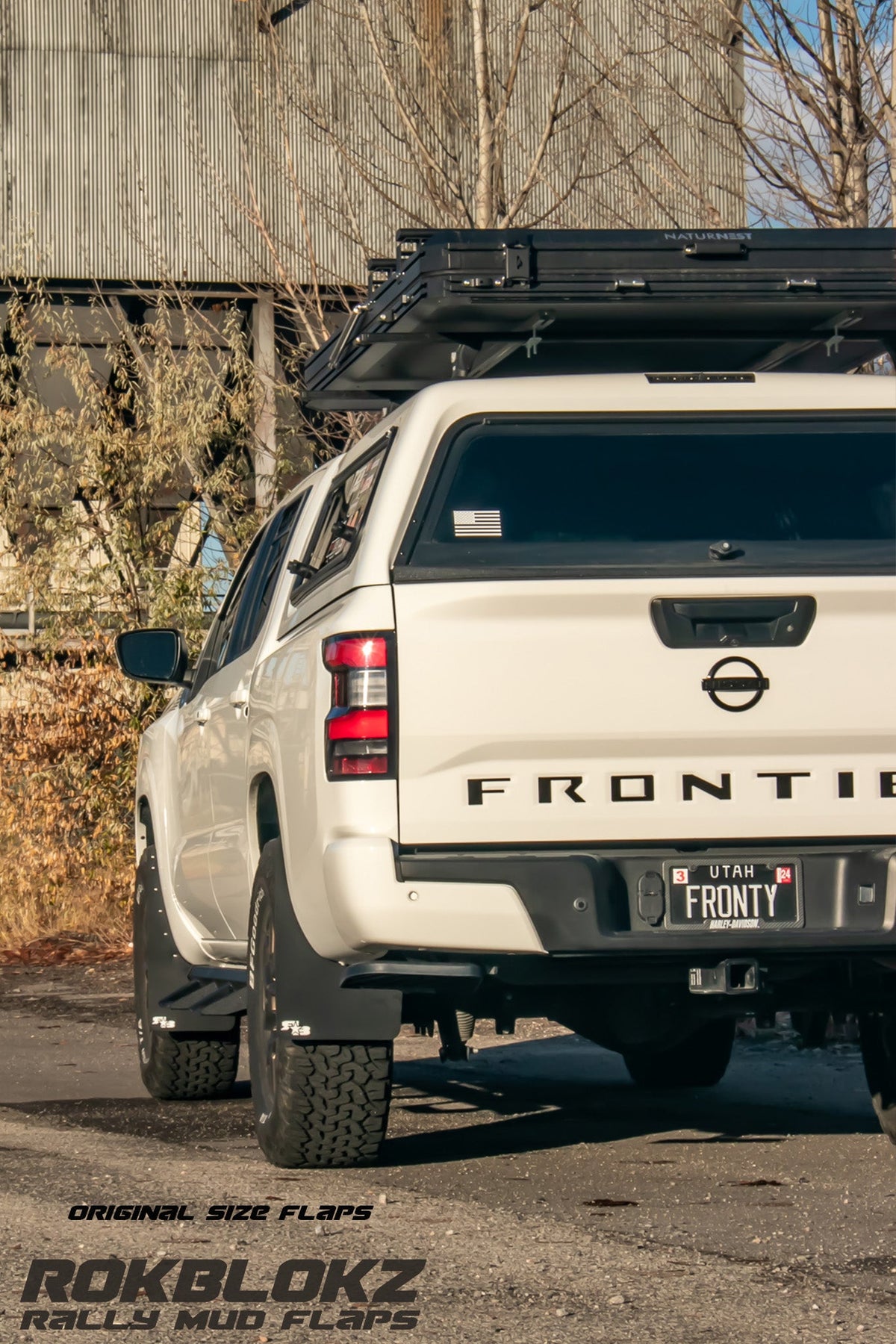 22+ Nissan Frontier SV Featuring Rokblokz Mud Flaps in Black - Driver rear