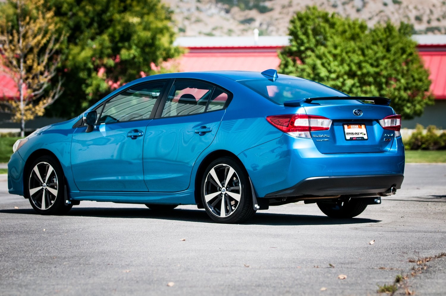 17 Impreza featuring Rokblokz Mud Flaps in Black w/ White logo Original 