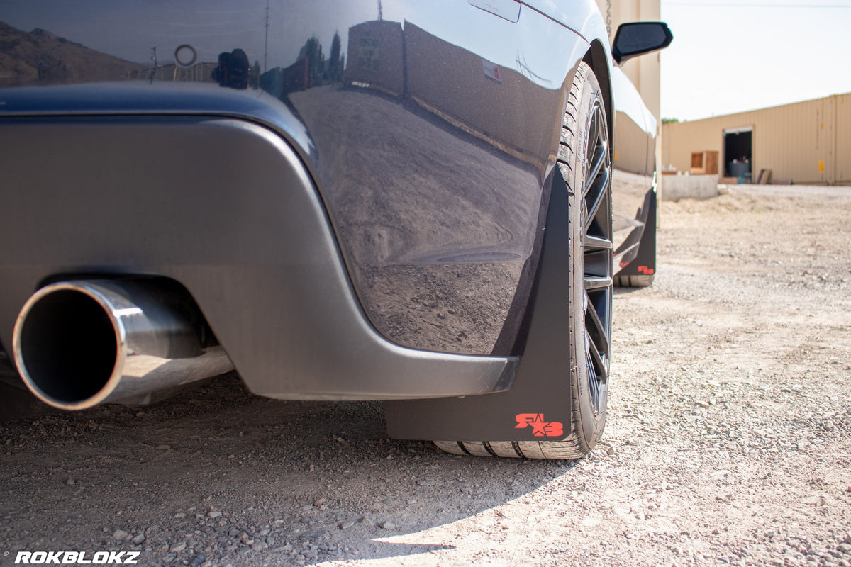 2016 Camaro featuring Rokblokz Rally Style Mud Flaps in Black w/ red logo