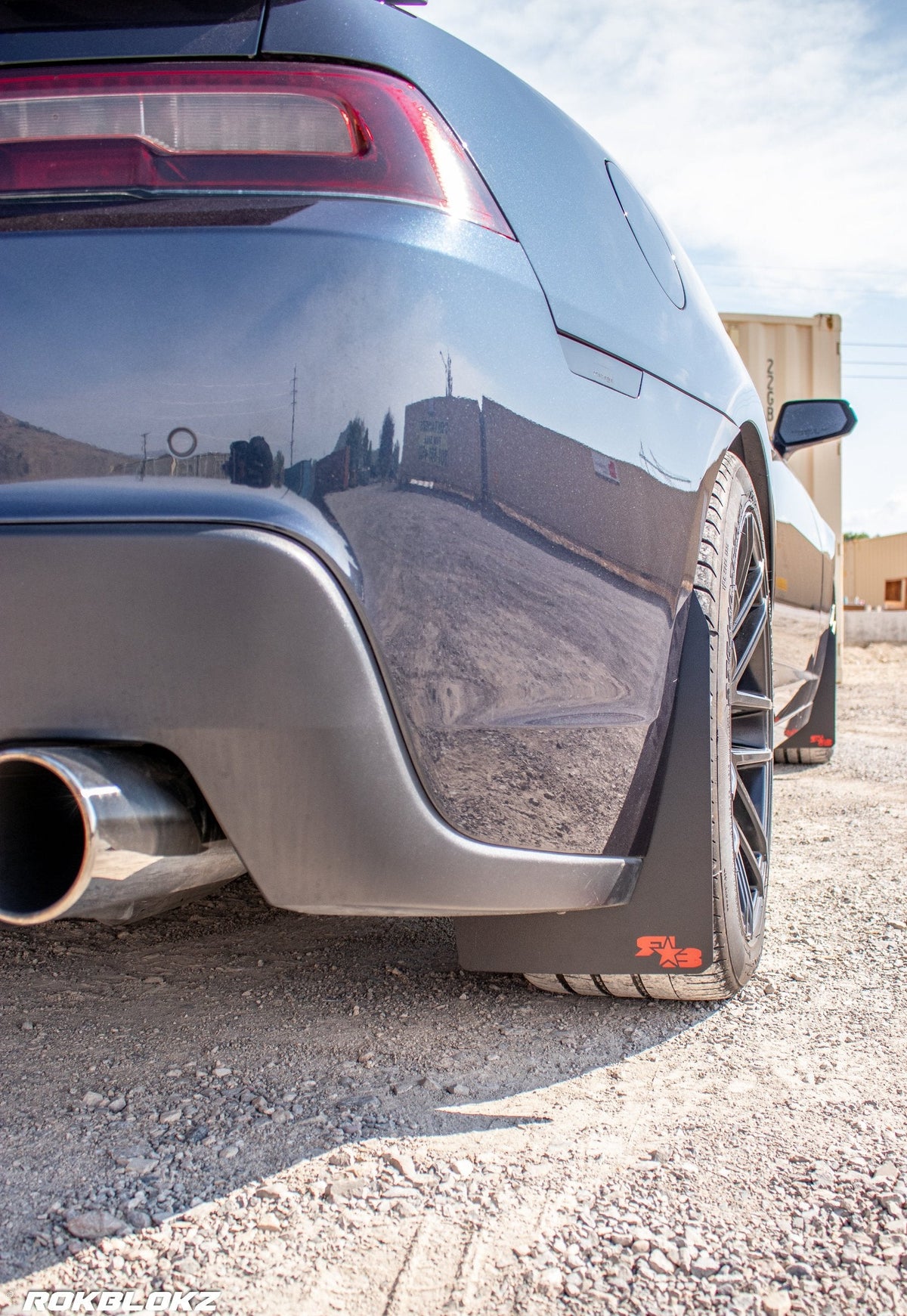 2016 Camaro featuring Rokblokz Rally Style Mud Flaps in Black w/ red logo