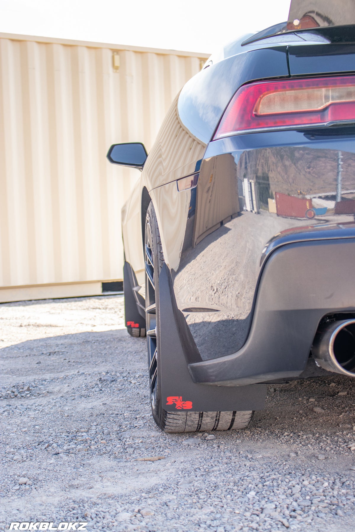 2016 Camaro featuring Rokblokz Rally Style Mud Flaps in Black w/ red logo