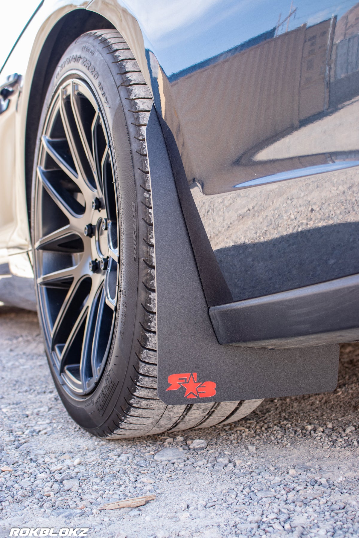 2016 Camaro featuring Rokblokz Rally Style Mud Flaps in Black w/ red logo