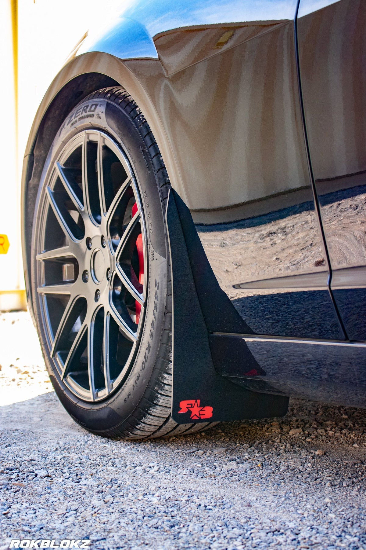 2016 Camaro featuring Rokblokz Rally Style Mud Flaps in Black w/ red logo