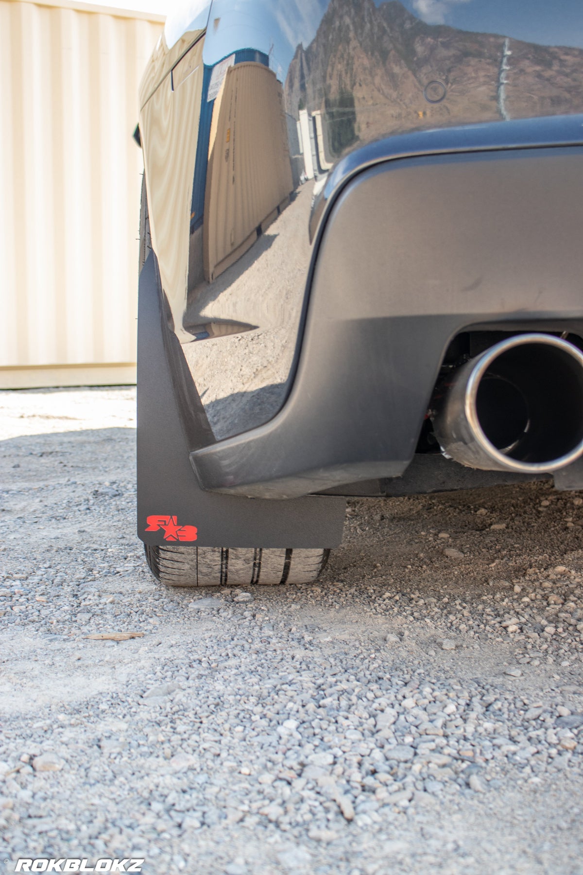 2016 Camaro featuring Rokblokz Rally Style Mud Flaps in Black w/ red logo