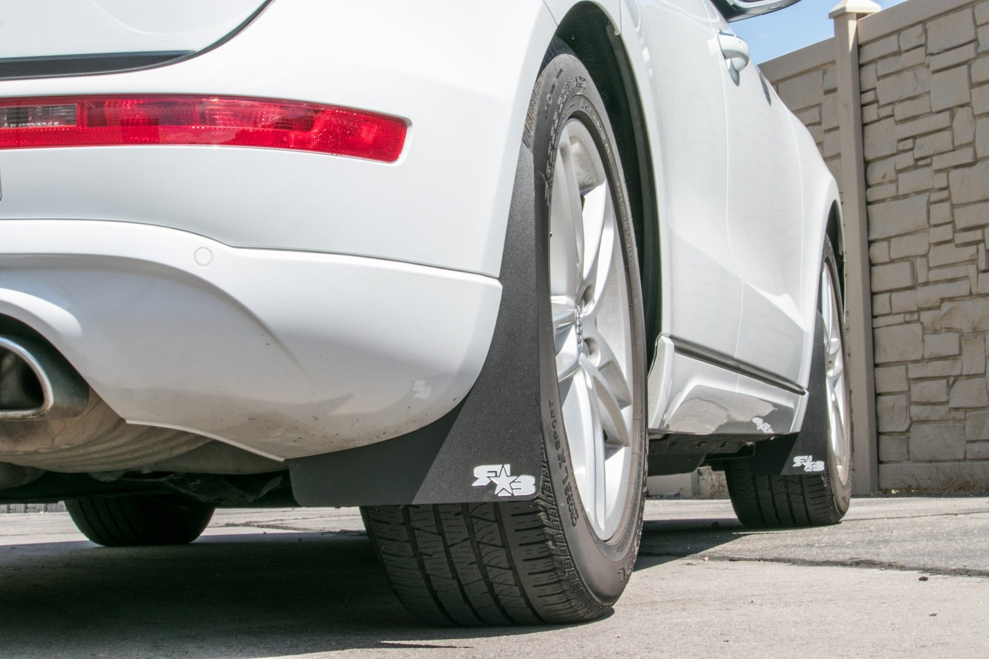 Audi Q5 featuring Black with White logo Original Mud flaps by ROKBLOKZ