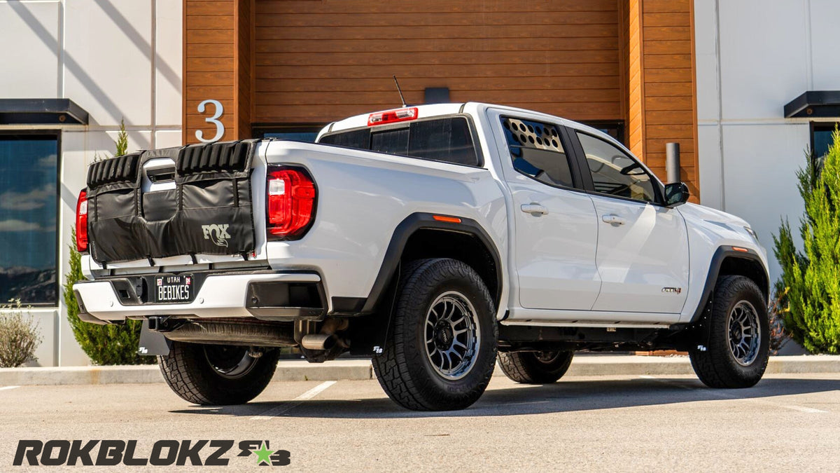 2023+ GMC Canyon AT4 Featuring Rokblokz Mud flaps in black - rear 3/4.1