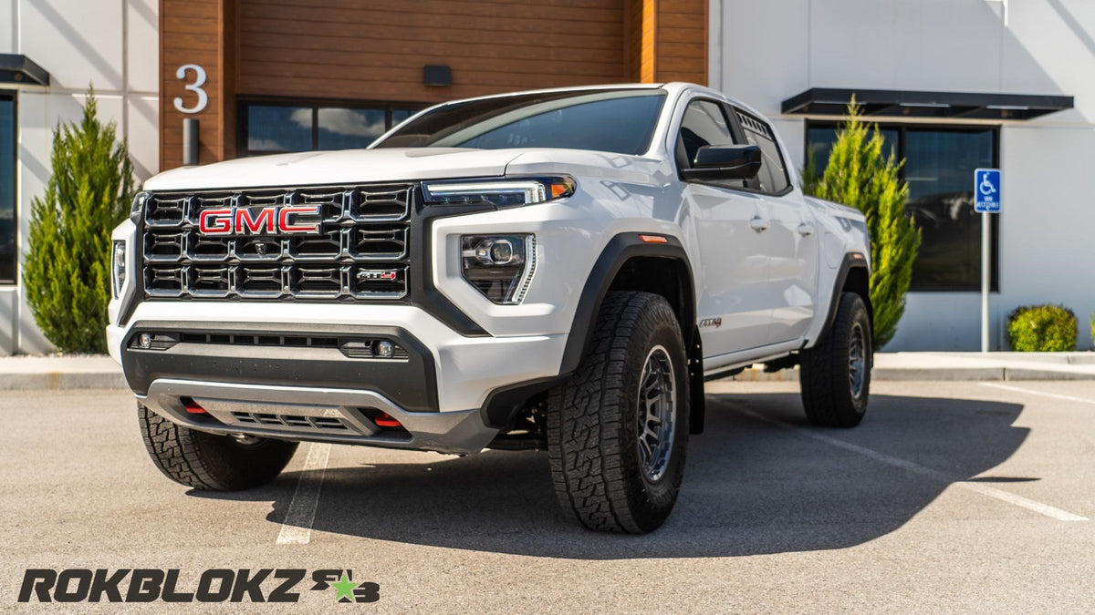 2023+ GMC Canyon AT4 Featuring Rokblokz Mud flaps in black - truck from front