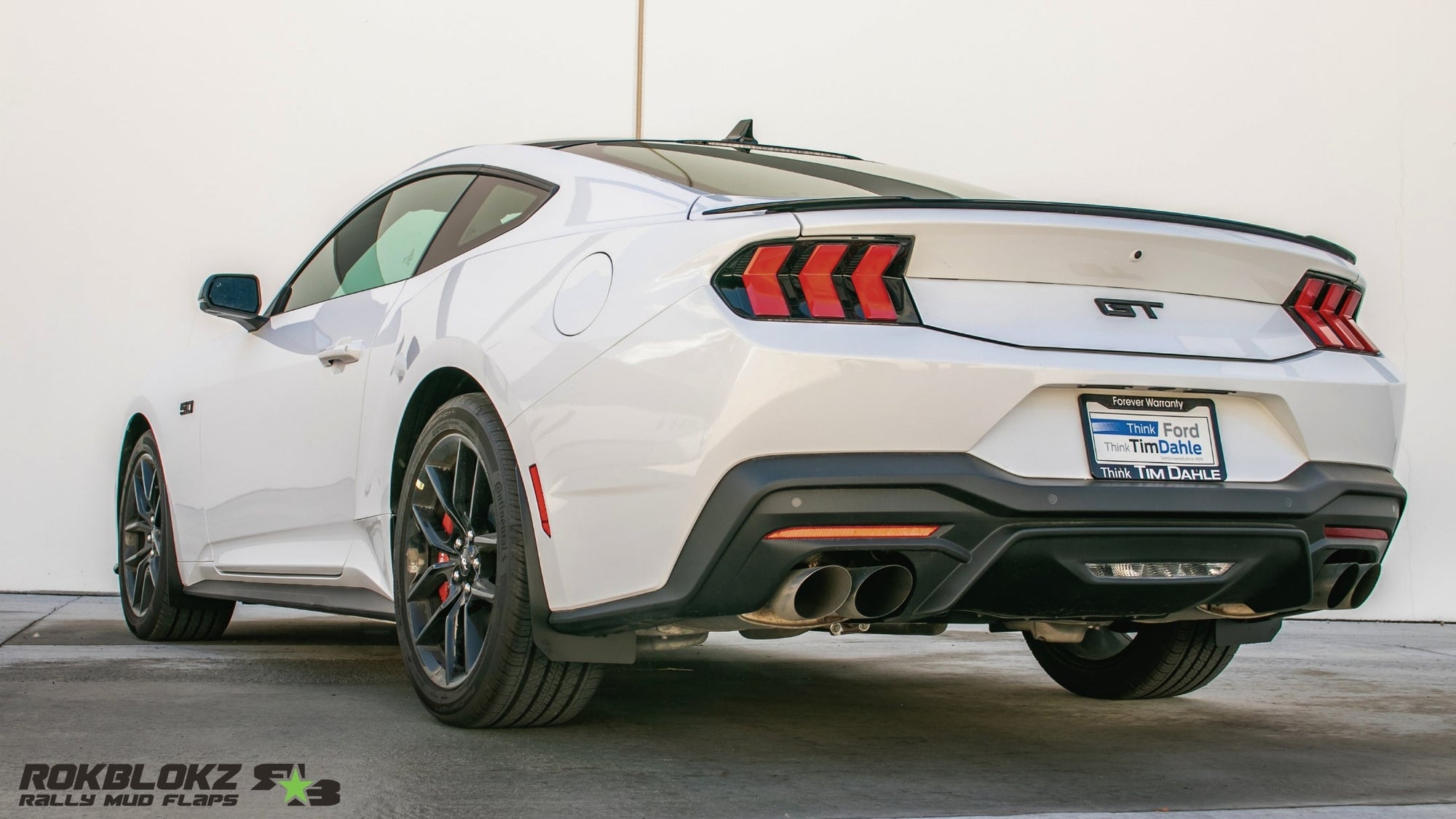 2024 Mustang GT featuring ROKBLOKZ Splash Guards - rear 3/4 view