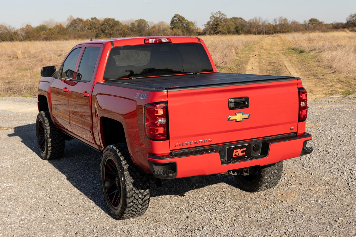 Hard Tri-Fold Flip Up Bed Cover | 6&#39;7&quot; Bed | Rail Cap | Chevy/GMC 1500/2500HD/3500HD (14-19)