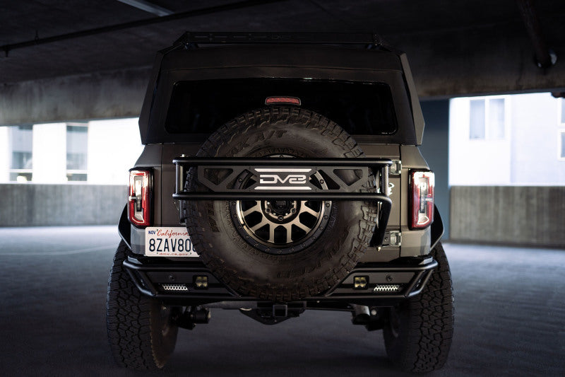 DV8 Offroad 21-23 Ford Bronco Spare Tire Guard &amp; Accessory Mount